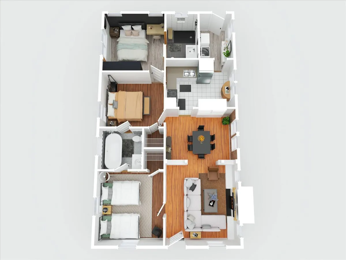 A broad, open-concept space with a clear view of the living room seating, dining table, master bedroom, guest room, and kitchen. The area is designed for both gatherings and quiet moments, with inviting décor and a sense of interconnectedness between spaces.